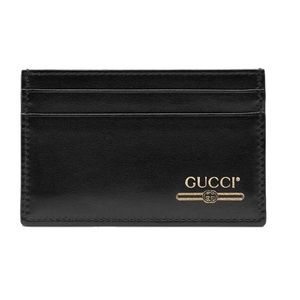 The Gucci Leather Gold Logo Card Holder $485